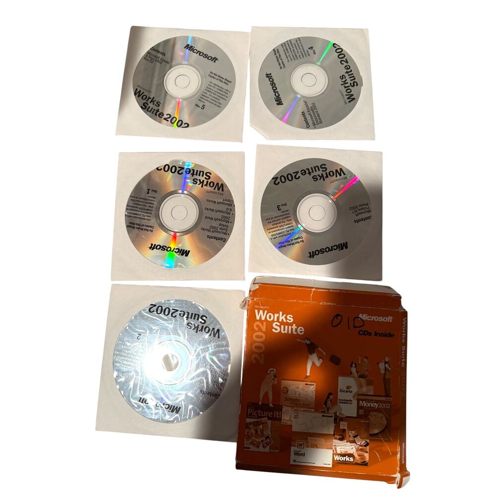 Microsoft Works Suite 2002 w/ product key (Word, Works, Money, Encarta, &c.)